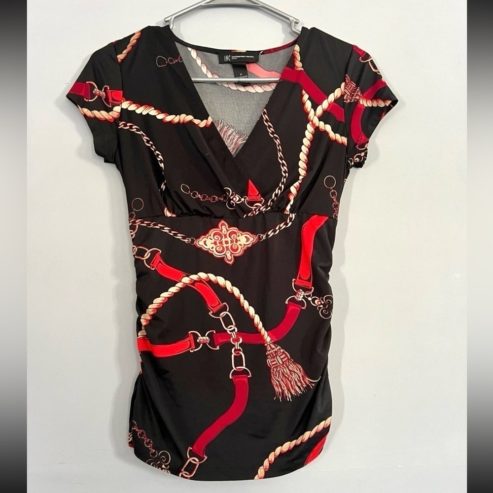 INC International Concepts - Black v-neck top with red/gold design